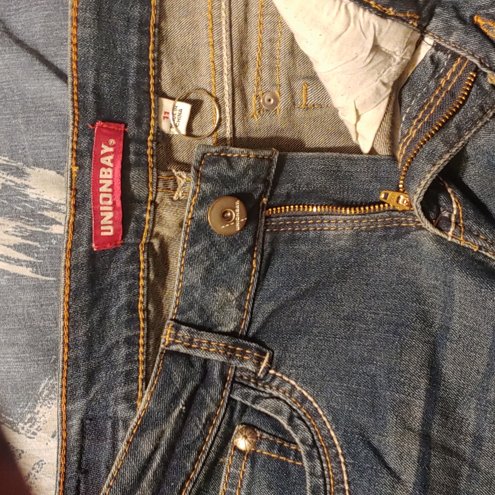 Knee length blue jean shorts